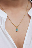 Korte ketting met turquoise hangertje