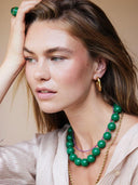 Groene korte ketting met grote ronde kralen