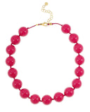 Roze korte ketting met grote ronde kralen