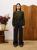 Donkergroene knit pivoine