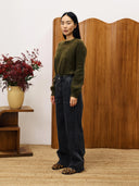 Donkergroene knit pivoine