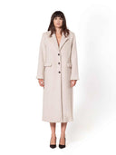 Beige lange wollen manteljas