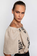 Beige off-shoulder top met aztec