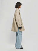 Beige trenchcoat tikka