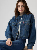 Blauwe kraagloze sherpa trucker jacket