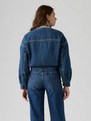 Blauwe kraagloze sherpa trucker jacket