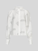 Witte blouse orkidea