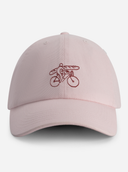 Lichtroze cap baguette et biciclette