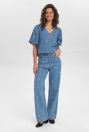 Jeans met bloemen nuibiza