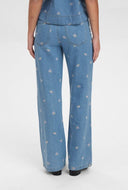Jeans met bloemen nuibiza