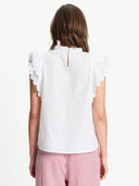 Off-white top met ruffles