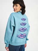 Licht blauwe sweater met opdruk