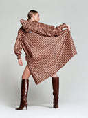 Bruine regenponcho damier