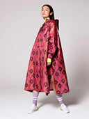 Roze regenponcho ikat