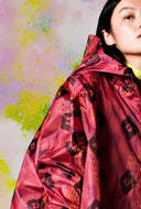 Roze regenponcho ikat