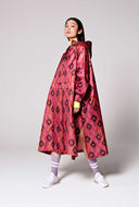 Roze regenponcho ikat