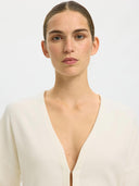 Creme getailleerd vest anemone